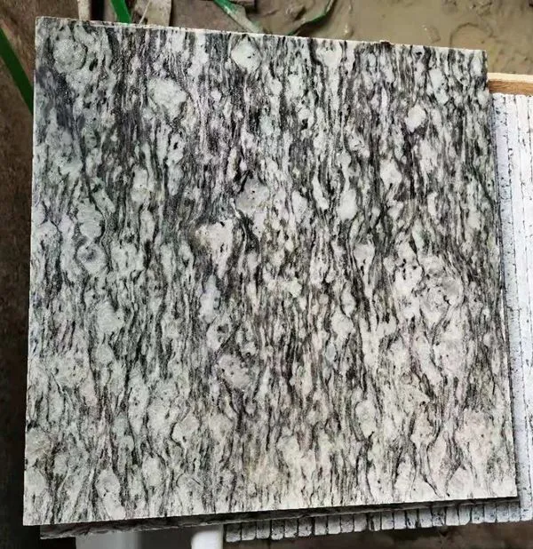 Biela žula v spreji